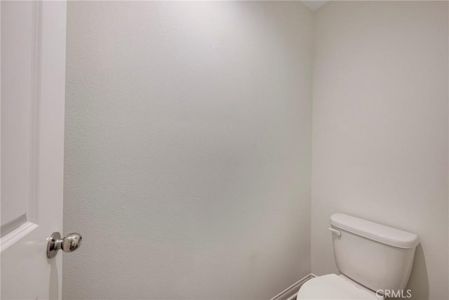 bathroom featuring toilet