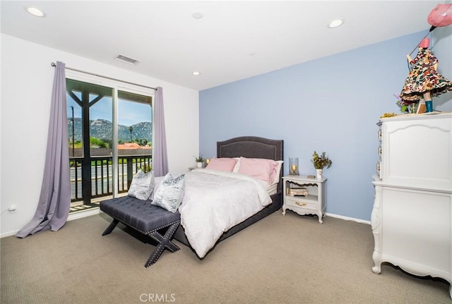 bedroom with recessed lighting, access to outside, visible vents, and light colored carpet