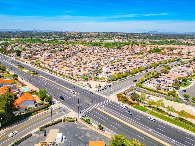 bird's eye view with a mountain view and a residential view