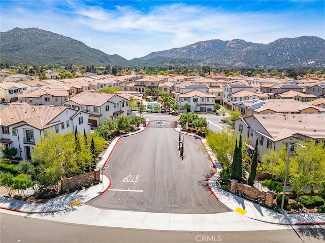 aerial view featuring a mountain view and a residential view