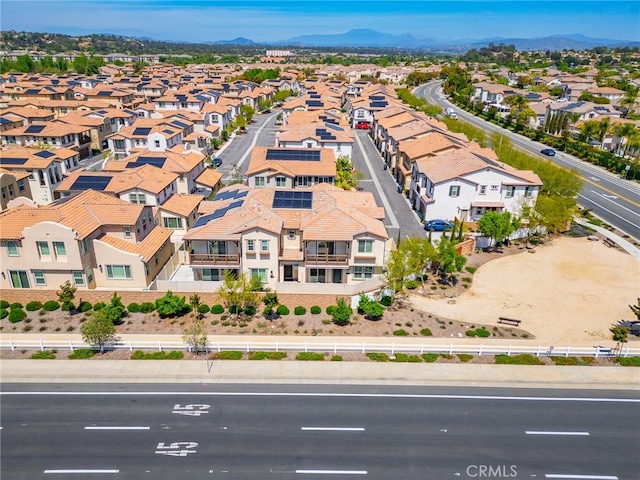 aerial view featuring a mountain view and a residential view