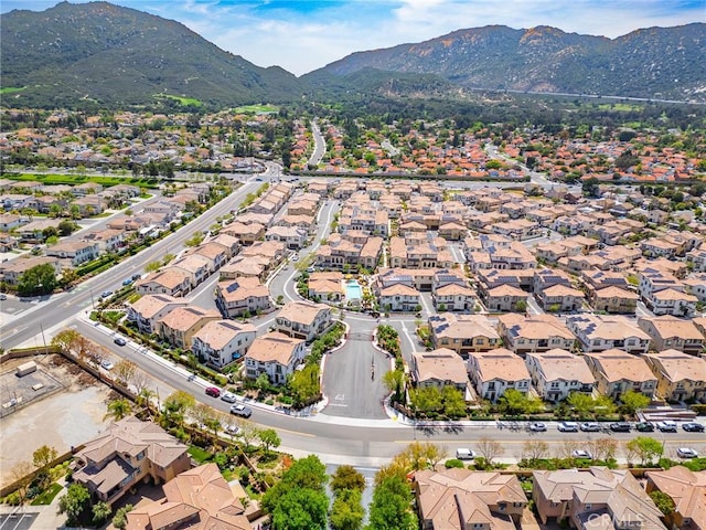 birds eye view of property with a residential view and a mountain view