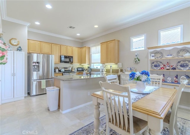 1643 Landmark Way, Beaumont, CA 92223 - kitchen with stainless steel appliances, light brown cabinets, visible vents, ornamental molding, and recessed lighting
