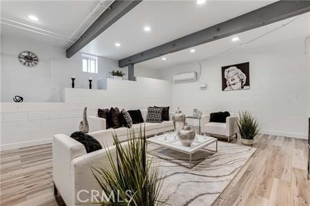 1440 Holbrook St, Eagle Rock, CA 90041 - living room with a wall mounted air conditioner, beamed ceiling, recessed lighting, and wood finished floors