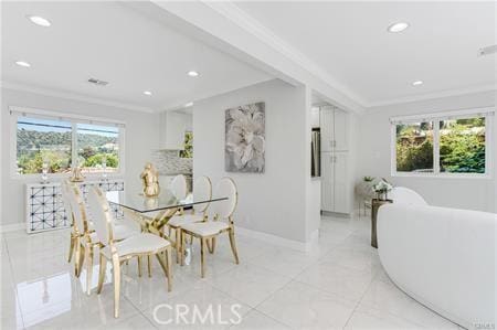 1440 Holbrook St, Eagle Rock, CA 90041 - dining space with crown molding, light tile patterned floors, baseboards, and recessed lighting