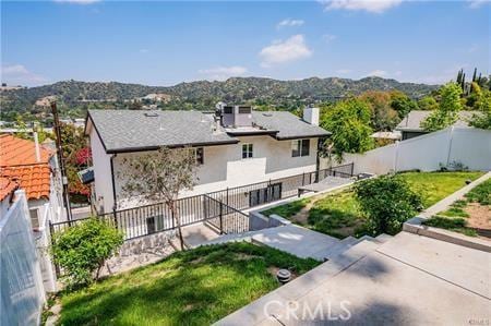 1440 Holbrook St, Eagle Rock, CA 90041 - view of property's community featuring a fenced backyard and a mountain view