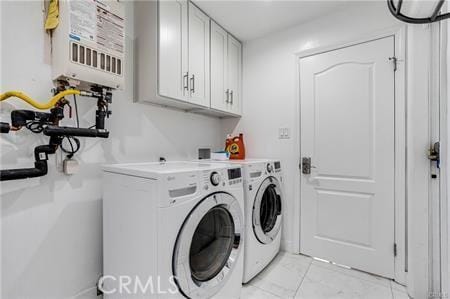 1440 Holbrook St, Eagle Rock, CA 90041 - laundry area with marble finish floor, water heater, cabinet space, and independent washer and dryer