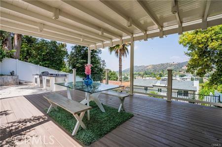 1440 Holbrook St, Eagle Rock, CA 90041 - wooden terrace featuring an outdoor kitchen and outdoor dining space