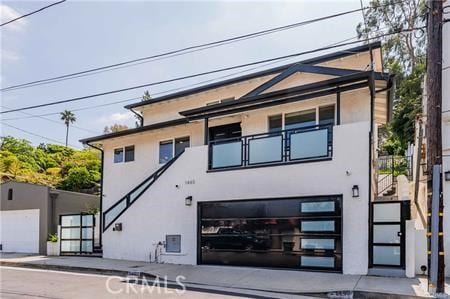 1440 Holbrook St, Eagle Rock, CA 90041 - view of front facade featuring stucco siding and stairs