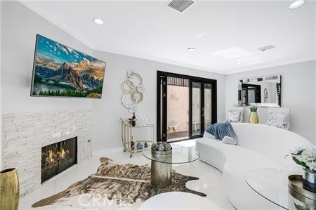 1440 Holbrook St, Eagle Rock, CA 90041 - living room with recessed lighting, a fireplace, and visible vents