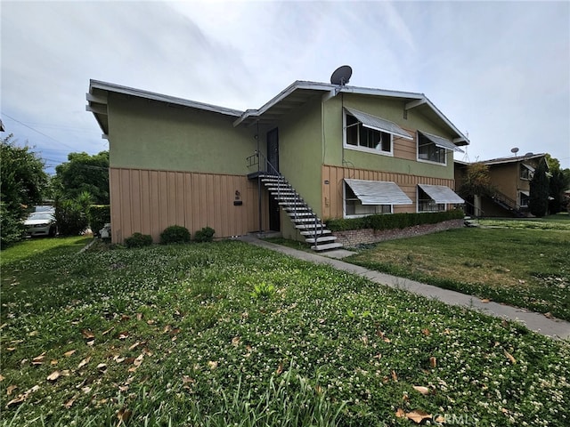 3734 N Abby St, Fresno, CA 93726 - view of front of home with stairs and a front lawn