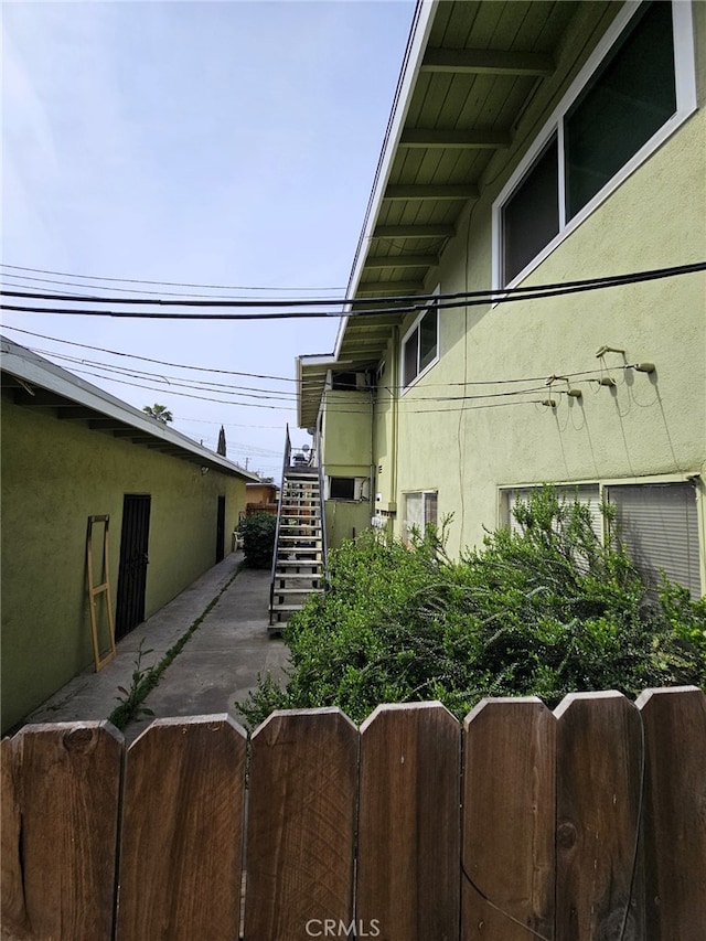 3734 N Abby St, Fresno, CA 93726 - view of home's exterior with stairs and stucco siding