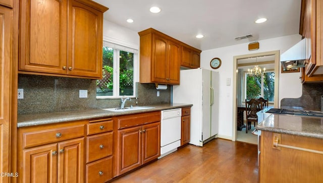 10424 Mcvine Ave, Sunland, CA 91040 - kitchen with a sink, white appliances, a chandelier, plenty of natural light, and recessed lighting