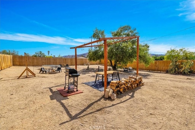 74825 Alta Loma Dr Unit 29, Palms, CA 92277 - view of jungle gym featuring a fenced backyard