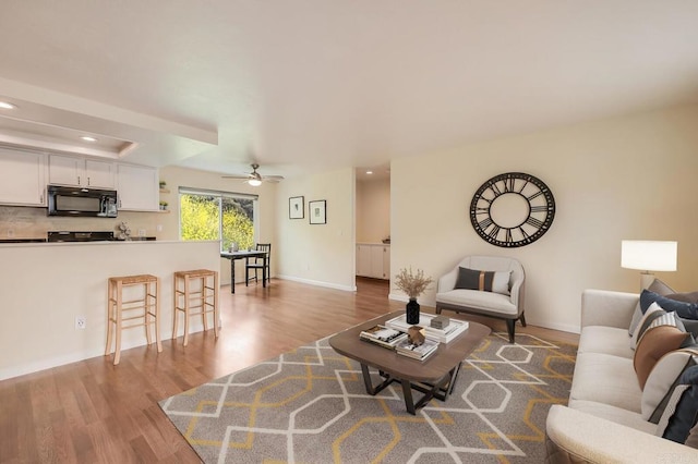 552 Canyon Dr Unit 15, Oceanside, CA 92054 - living area featuring wood finished floors, ceiling fan, recessed lighting, and baseboards