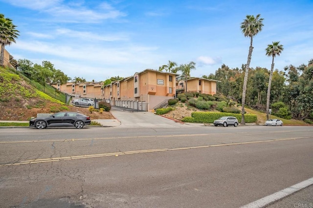 552 Canyon Dr Unit 15, Oceanside, CA 92054 - view of front facade with fence, a gate, and stucco siding