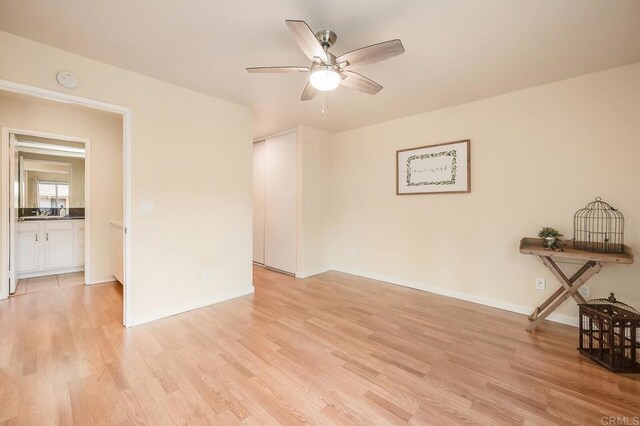 552 Canyon Dr Unit 15, Oceanside, CA 92054 - empty room featuring light wood-type flooring, a ceiling fan, and baseboards