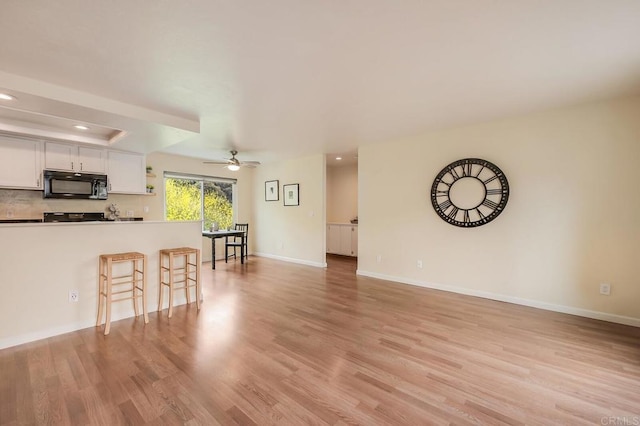 552 Canyon Dr Unit 15, Oceanside, CA 92054 - living area featuring a ceiling fan, light wood finished floors, recessed lighting, and baseboards