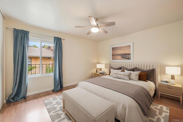 552 Canyon Dr Unit 15, Oceanside, CA 92054 - bedroom with wood finished floors, ceiling fan, and baseboards