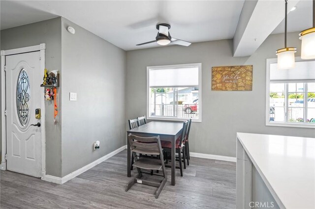 22702 Menlo Ave, Torrance, CA 90502 - dining room featuring ceiling fan, wood finished floors, and baseboards