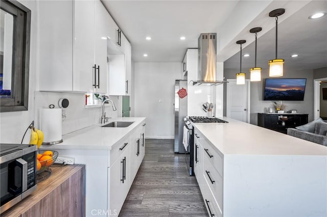 22702 Menlo Ave, Torrance, CA 90502 - kitchen with wall chimney exhaust hood, a sink, appliances with stainless steel finishes, light countertops, and recessed lighting