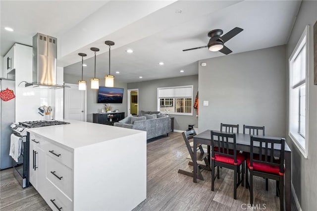 22702 Menlo Ave, Torrance, CA 90502 - kitchen featuring island exhaust hood, stainless steel appliances, healthy amount of natural light, and recessed lighting