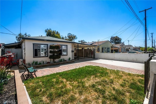 22702 Menlo Ave, Torrance, CA 90502 - ranch-style home with stucco siding and a patio area