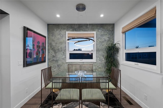 dining room with visible vents, baseboards, a healthy amount of sunlight, and recessed lighting
