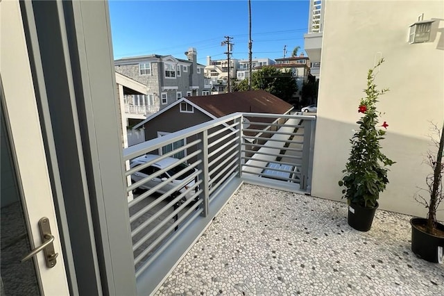 balcony featuring a residential view