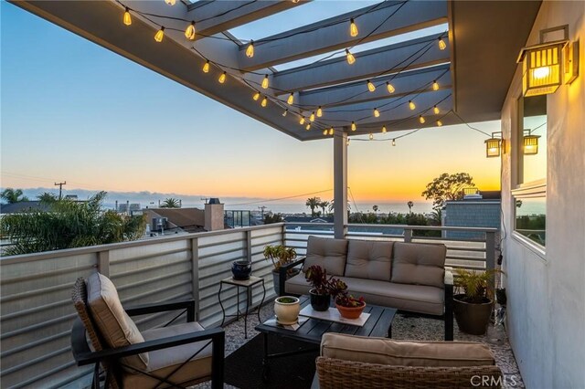 exterior space featuring outdoor lounge area and a pergola