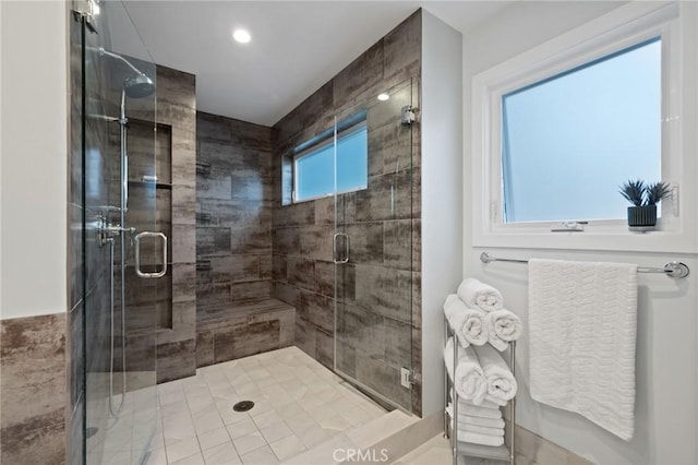 full bath with a shower stall