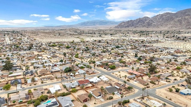 drone / aerial view with a mountain view and a residential view