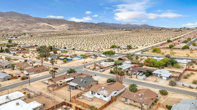 aerial view featuring a mountain view and a residential view