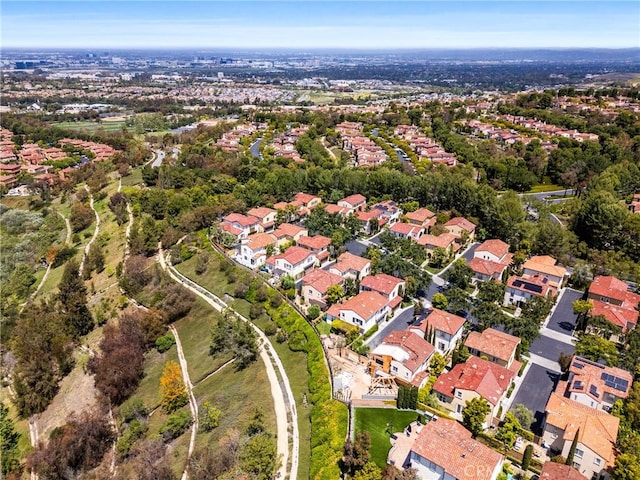 birds eye view of property with a residential view