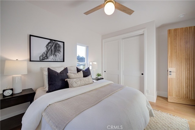 582 Paseo St, Arroyo Grande, CA 93420 - bedroom featuring wood finished floors, a closet, baseboards, and ceiling fan