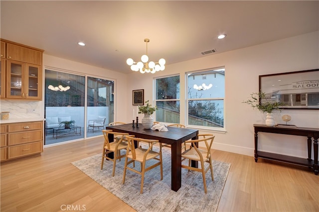 582 Paseo St, Arroyo Grande, CA 93420 - dining room featuring a chandelier, light wood-style floors, healthy amount of natural light, and recessed lighting