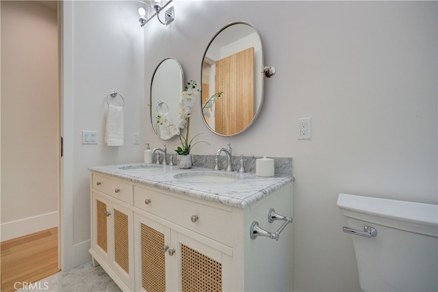 582 Paseo St, Arroyo Grande, CA 93420 - bathroom with toilet, baseboards, and double vanity