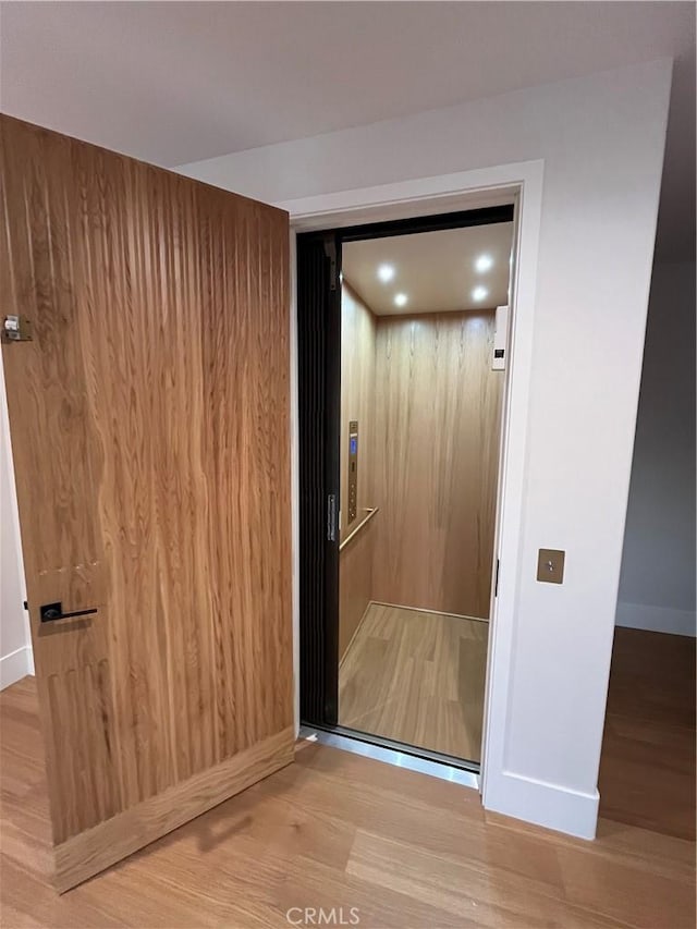 582 Paseo St, Arroyo Grande, CA 93420 - elevator with wood finished floors and baseboards