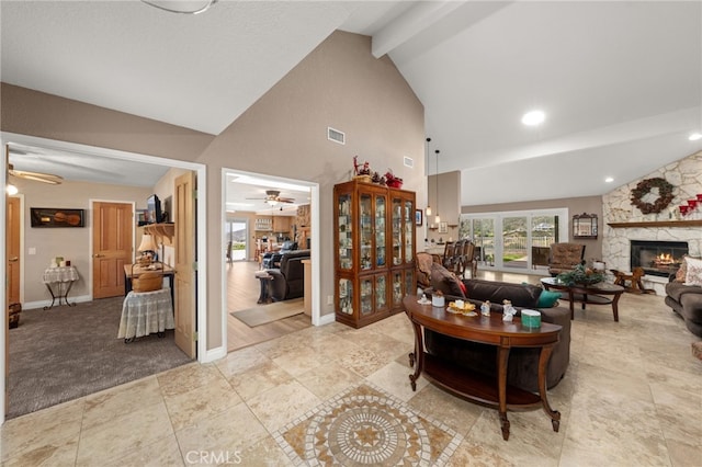 36608 Oak Ridge Dr, Yucaipa, CA 92399 - living area with ceiling fan, a fireplace, high vaulted ceiling, baseboards, and recessed lighting