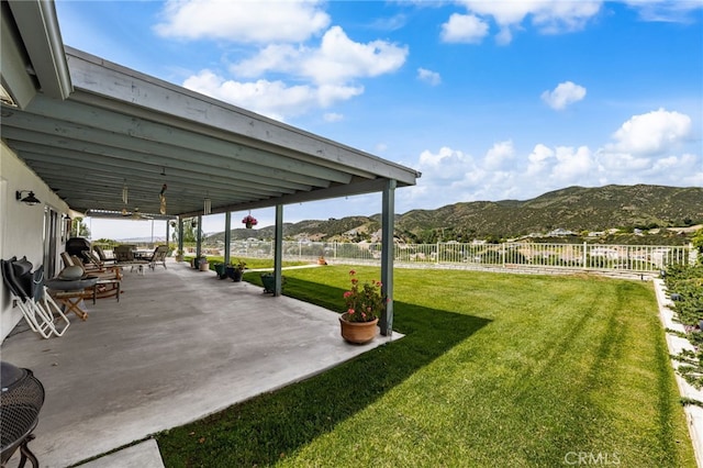 36608 Oak Ridge Dr, Yucaipa, CA 92399 - view of patio with a mountain view and a ceiling fan