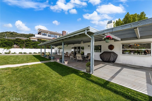 36608 Oak Ridge Dr, Yucaipa, CA 92399 - back of property featuring ceiling fan, a patio, and stucco siding