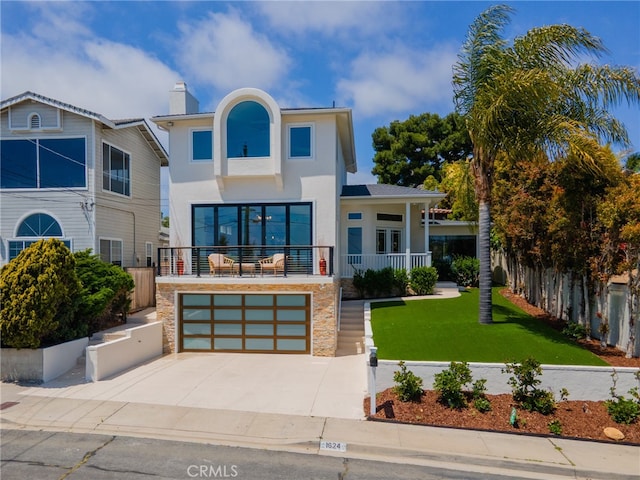 1624 Malden St, San Diego, CA 92109 - contemporary home with stucco siding, driveway, stone siding, a garage, and a chimney