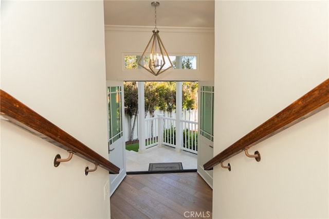 1624 Malden St, San Diego, CA 92109 - foyer with wood finished floors, a chandelier, and crown molding