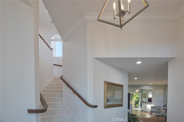 1624 Malden St, San Diego, CA 92109 - staircase featuring a chandelier, recessed lighting, and ornamental molding