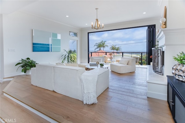 1624 Malden St, San Diego, CA 92109 - living room with crown molding, light wood-style flooring, a chandelier, baseboards, and recessed lighting