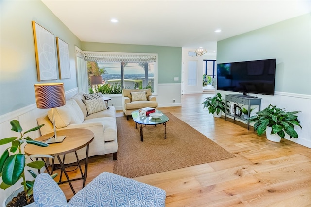 1624 Malden St, San Diego, CA 92109 - living area featuring a wainscoted wall, wood finished floors, and recessed lighting