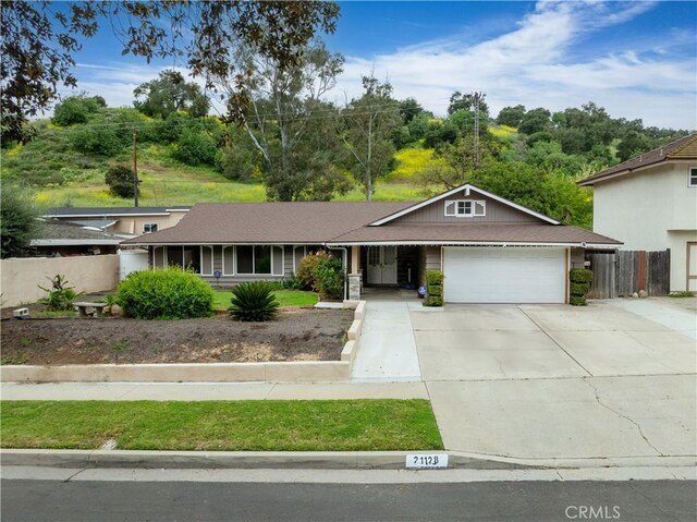 21128 Trigger Ln, Diamond Bar, CA 91765 - single story home with an attached garage, driveway, and fence