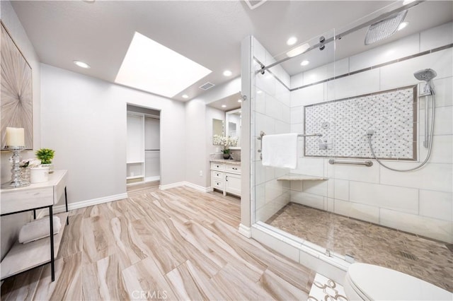 21128 Trigger Ln, Diamond Bar, CA 91765 - bathroom with a stall shower, vanity, toilet, recessed lighting, and baseboards