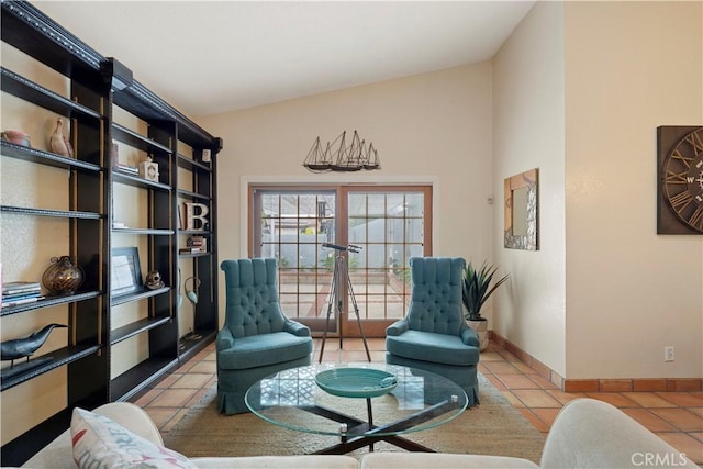 living area with tile patterned flooring and baseboards
