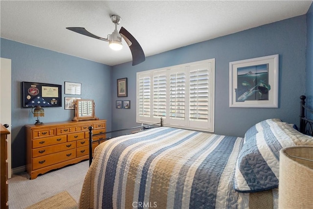bedroom with carpet flooring and ceiling fan